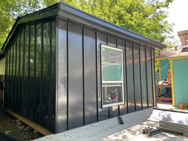Black standing seam metal wall panels for Roof Inspection in Bend