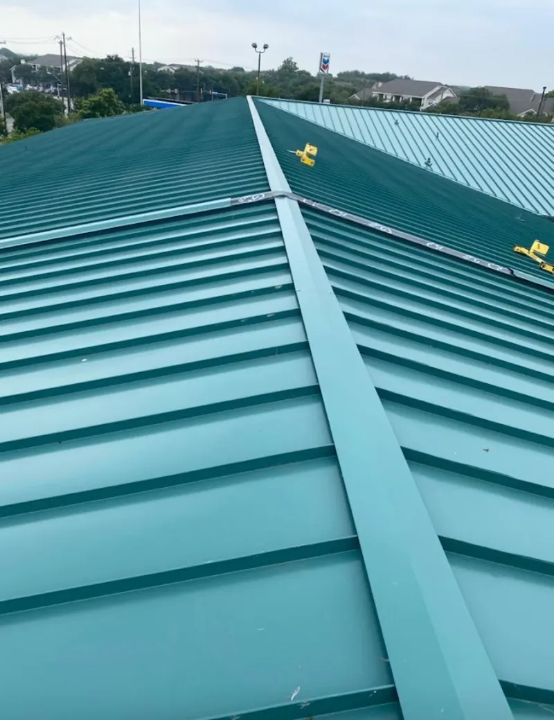 Green commercial metal roof ridge and valley for Metal Roof Repair in Bend